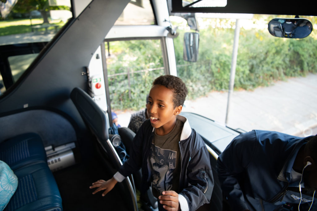 Child boarding a coach