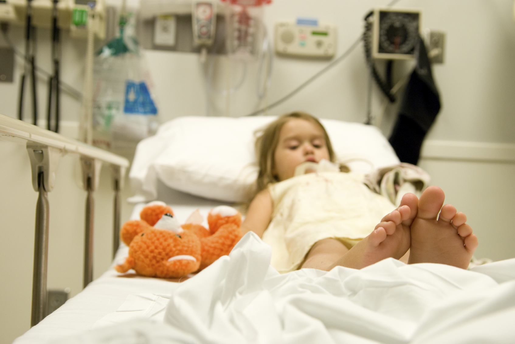 Little girl in hospital bed