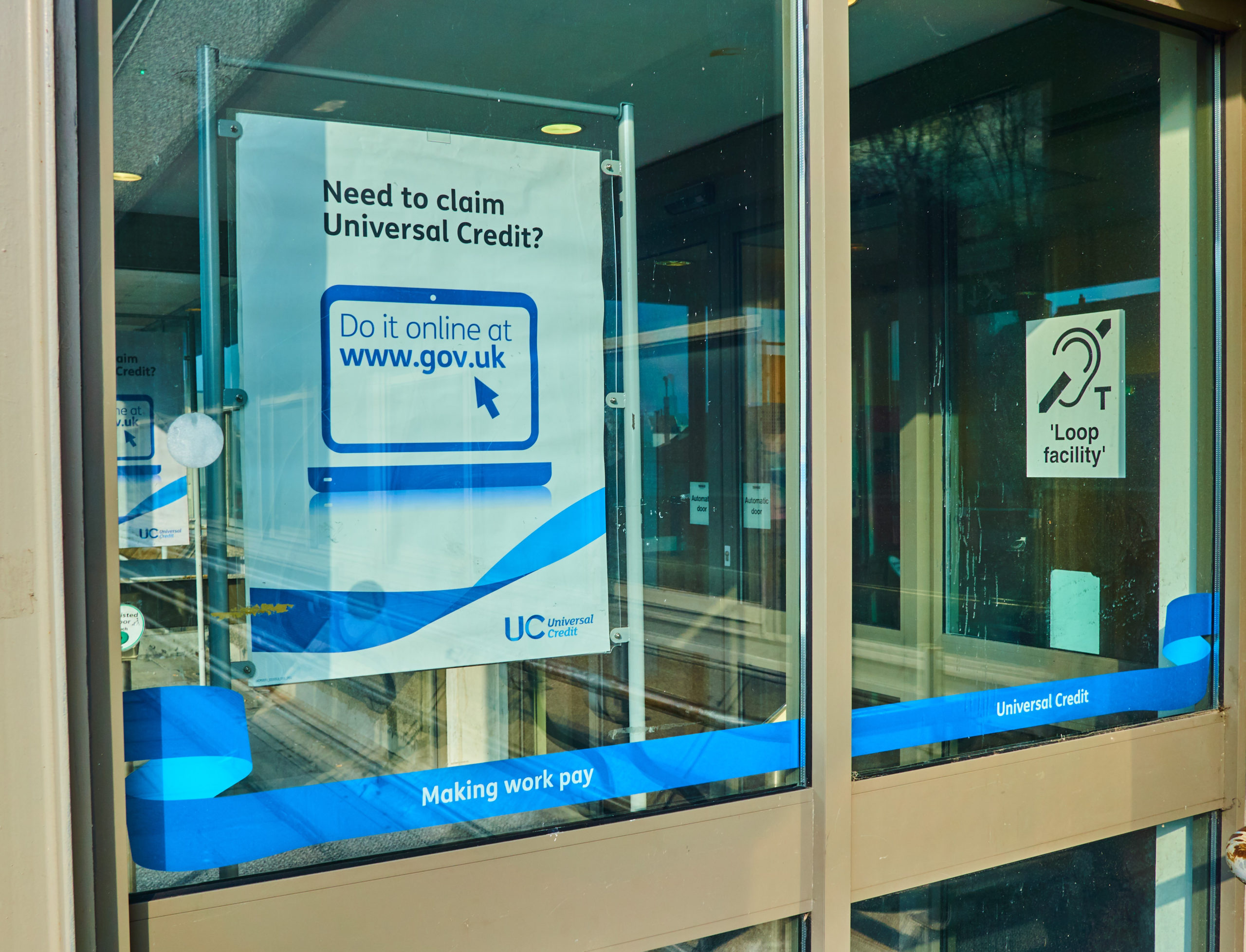 Universal Credit sign on job centre window