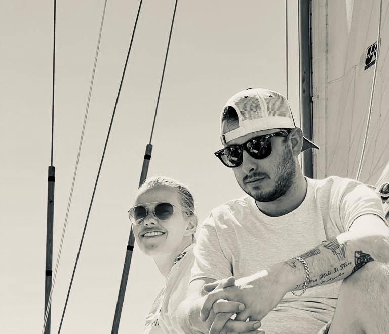 Thomas Roberts and wife Siena on sailing boat