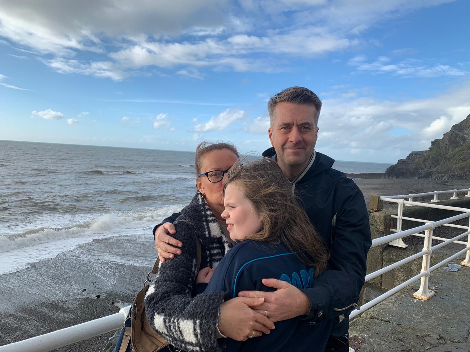 Lucy and son Flynn with dad at the seaside
