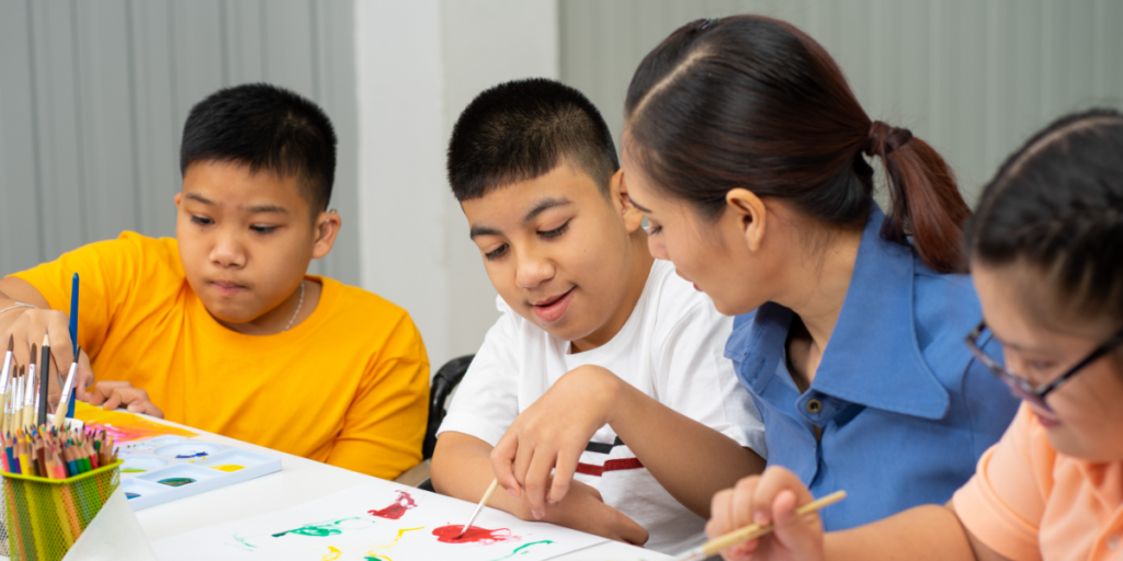 Teacher with children playing with educational toys