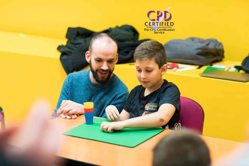 Adult with child playing table game