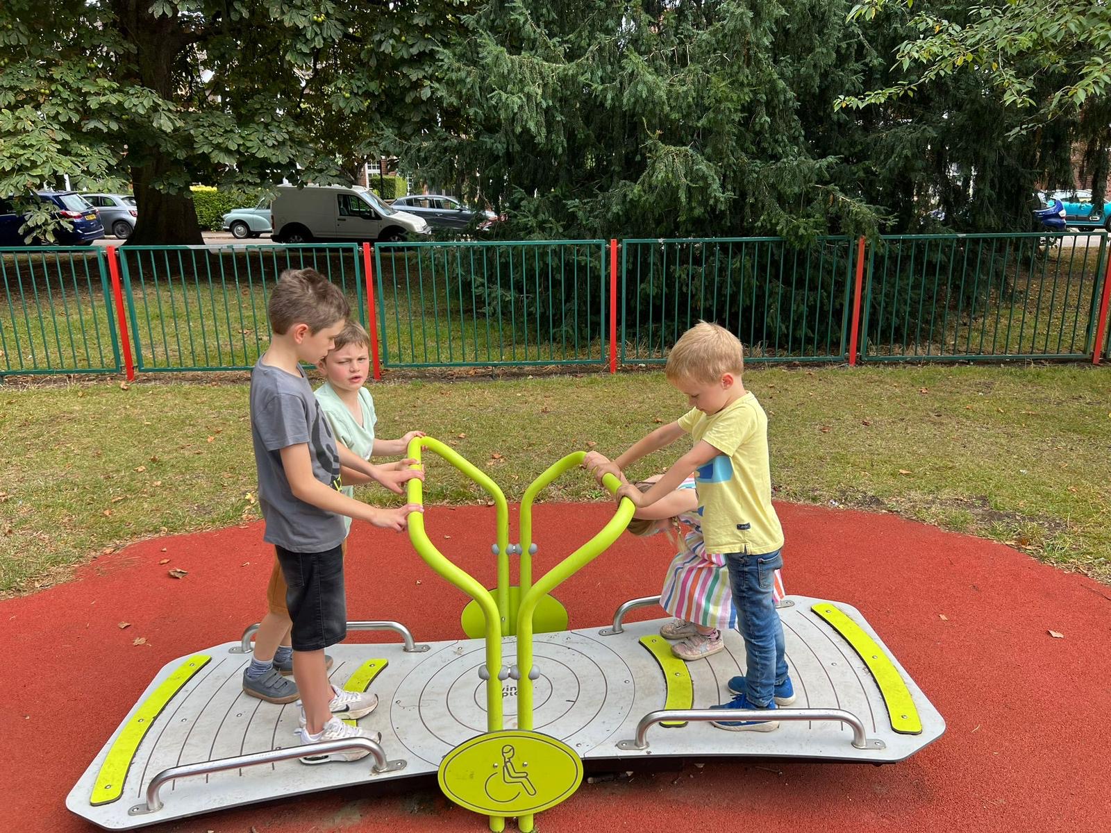 Children playing on a playground toy