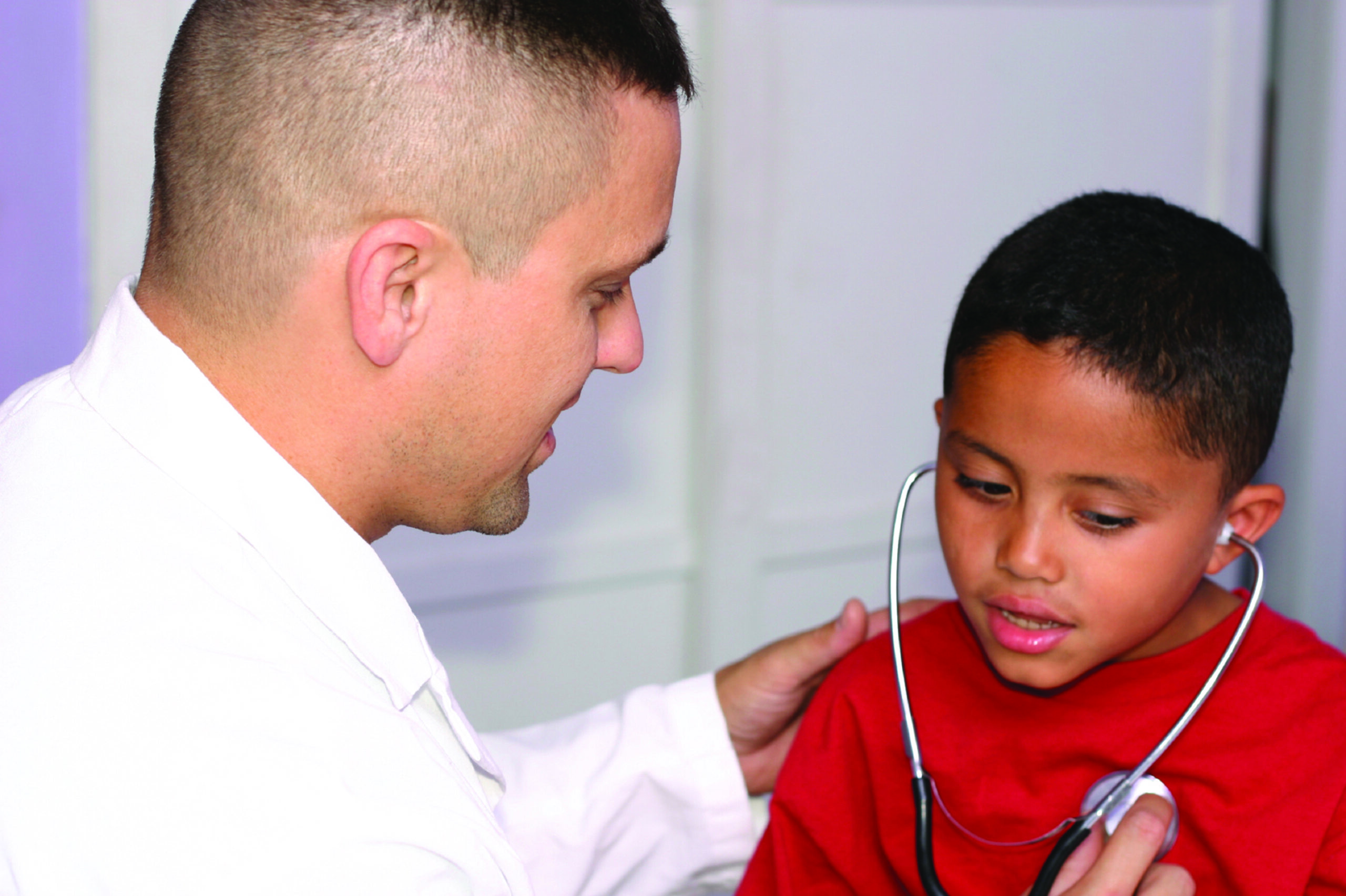 Doctor and child with stethescope