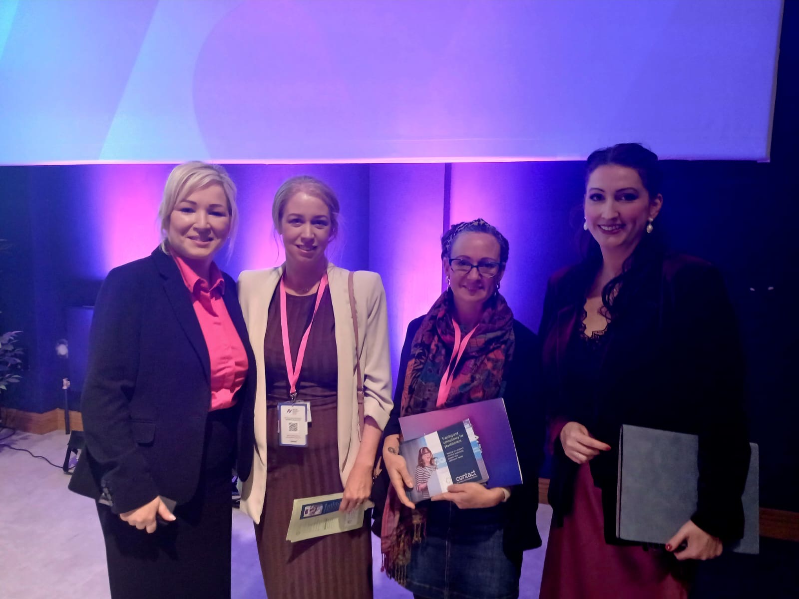 First Minister Michelle O'Neill and Deputy First Minister Emma Little-Pengelly MLA with Ursula McWilliams and Ellie Goff from Contact.