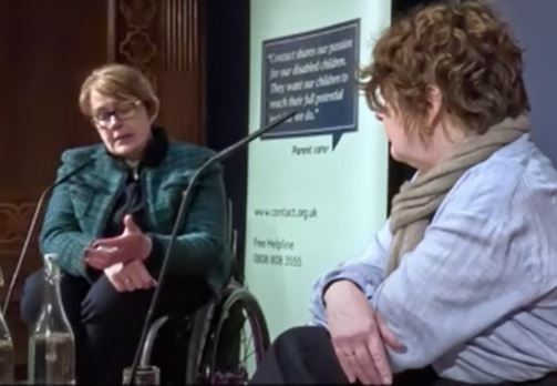 Baroness Tanni Grey-Thompson talks to broadcaster Jane Garvey in front of a Contact banner