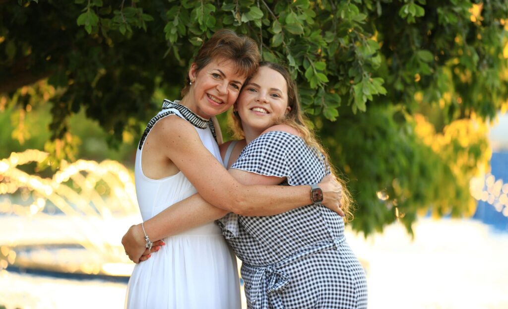 Jeanette and Rose hugging
